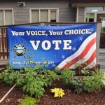 A banner encouraging Homer residents to vote is displayed outside City Hall on Thursday, Sept. 12, 2024 in Homer, Alaska. (Delcenia Cosman/Homer News)