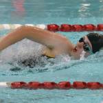 Homers Avery Briscoe competes in the 400-yard freestyle relay at the Kenai Invitational on Saturday, Sept. 21 at Kenai Central High School in Kenai. (Photo by Jeff Helminiak/Peninsula Clarion)