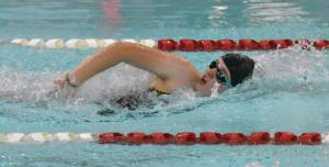 Homers Avery Briscoe competes in the 400-yard freestyle relay at the Kenai Invitational on Saturday, Sept. 21 at Kenai Central High School in Kenai. (Photo by Jeff Helminiak/Peninsula Clarion)