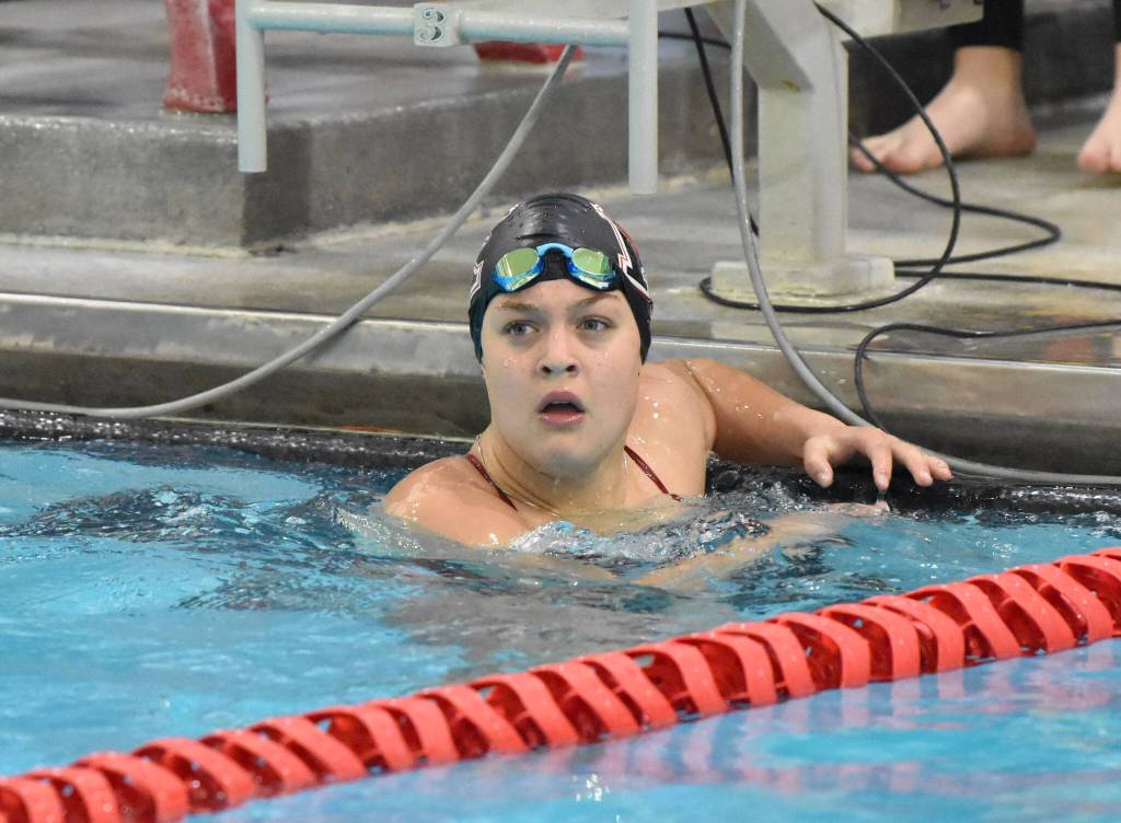 Kenai Centrals Abigail Price finishes the anchor leg in the 400-yard freestyle relay at the Kenai Invitational on Saturday, Sept. 21, 2024, at Kenai Central High School in Kenai, Alaska. (Photo by Jeff Helminiak/Peninsula Clarion)