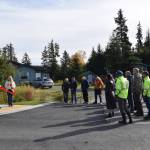 City of Homer representatives and staff and Homer community members gather for a ribbon cutting ceremony for the newly completed Ben Walters Lane Sidewalk Project on Monday, Sept. 30, 2024, at the corner of Ben Walters Lane and Smoky Bay Way in Homer, Alaska. (Delcenia Cosman/Homer News)