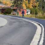 A local community member walks up Ben Walters Lane on the newly completed sidewalk on Monday, Sept. 30, 2024, in Homer, Alaska. (Delcenia Cosman/Homer News)