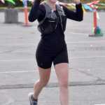 Kasilofs Ellie Tadych runs to victory in the womens marathon at the Kenai River Marathon on Sunday, Sept. 29, 2024, in Kenai, Alaska. (Photo by Jeff Helminiak/Peninsula Clarion)