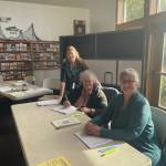 Poll workers volunteer at the Homer Chamber of Commerce on Tuesday, Oct. 1, 2024, in Homer, Alaska. (Emilie Springer/ Homer News)