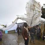 Sea Legs Stilt and Puppet Troupe parades down Pirate Alley with a raven puppet, boasting a 15-foot wingspan, at Ye Olde Harvest Festival at Karen Hornaday Park on Saturday, Oct. 5, 2024, in Homer, Alaska. (Delcenia Cosman/Homer News)
