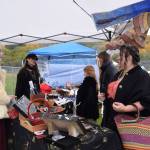 Fairgoers browse vendorss stalls for handicrafts and merchandise at Ye Olde Harvest Festival at Karen Hornaday Park on Saturday, Oct. 5, 2024, in Homer, Alaska. (Delcenia Cosman/Homer News)