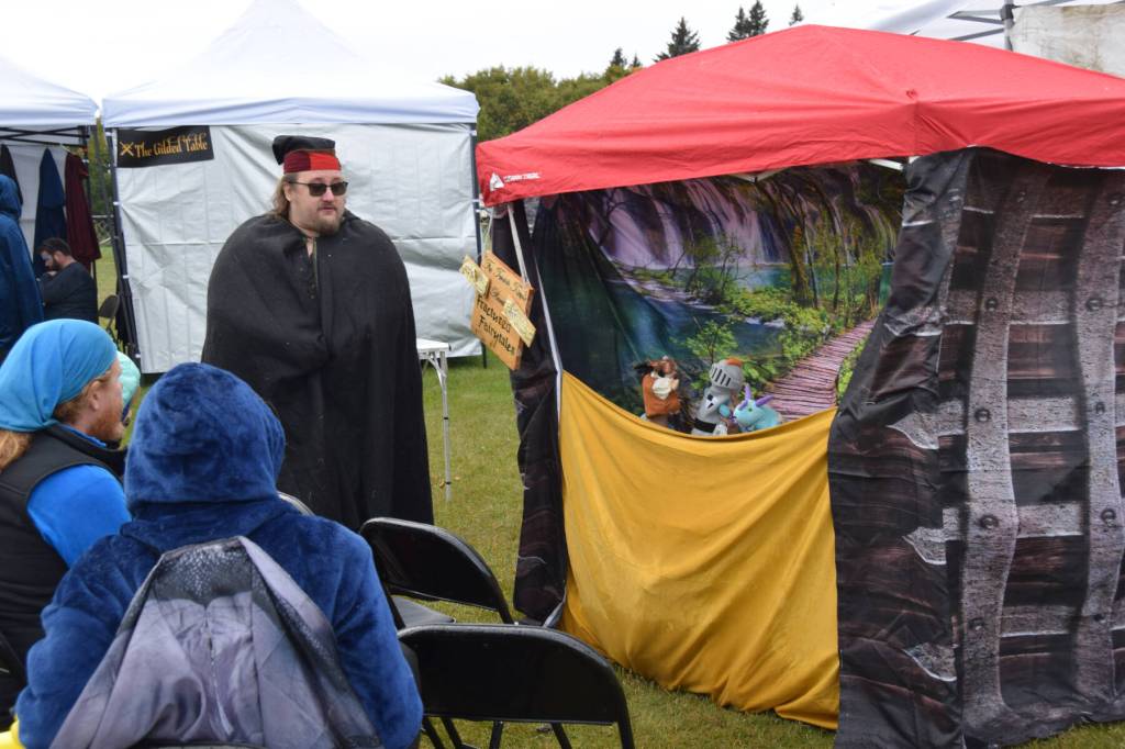 Twisted Tadpole, hailing from the 3 Barons Renaissance Fair in Anchorage, presents Fractured Fairytales puppet shows at Ye Olde Harvest Festival at Karen Hornaday Park on Saturday, Oct. 5, 2024, in Homer, Alaska. (Delcenia Cosman/Homer News)