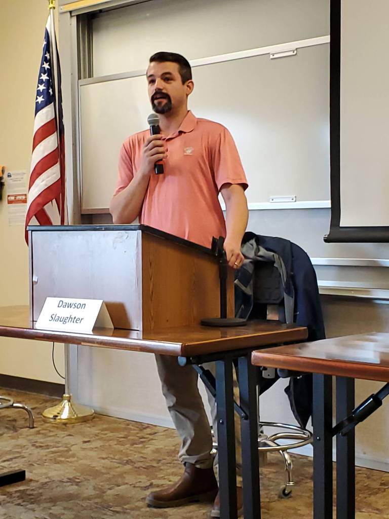 Anchor Point Chamber of Commerce president Dawson Slaughter gives his opening statement during a forum hosted by the Homer Chamber of Commerce for Alaska State House District 6 candidates on Monday, Oct. 14, 2024, at Kachemak Bay Campus in Homer, Alaska. (Delcenia Cosman/Homer News)