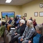 Homer community members gather in the Homer City Hall Cowles Council Chambers for a special Planning Commission meeting on Doyon, Limiteds revised application for the Lighthouse Village redevelopment on Wednesday, Oct. 16, 2024, in Homer, Alaska. (Delcenia Cosman/Homer News)