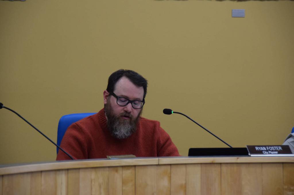 Homer city planner Ryan Foster reviews Doyon, Limiteds revised application for a conditional use permit for the Lighthouse Village planned unit development during a special Planning Commission meeting on Wednesday, Oct. 16, 2024, in the Homer City Hall Cowles Council Chambers in Homer, Alaska. (Delcenia Cosman/Homer News)
