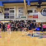 Brightly Thoning bumps the ball over the net during the varsity volleyball game against Nikiski on Thursday, Oct. 17, 2024, in the Homer High School Alice Witte Gymnasium in Homer, Alaska. (Emilie Springer/Homer News)