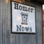 The Homer News sign hangs on the outside of the newspapers former office building on Landings Street on Thursday, Oct. 17, 2024, in Homer, Alaska. (Delcenia Cosman/Homer News)