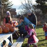 Delcenia Cosman/Homer News
Community members attending Homer Chamber of Commerces third annual Fall Fest vote for their favorite pumpkin created during the events Pumpkin Carving Contest on Saturday, Oct. 26.<ins>, 2024, at the Homer Chamber of Commerce and Visitor Center in Homer, Alaska</ins>