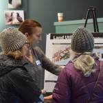 Agnew::Beck Consultant Project Leader Shelly Wade (center) answers questions from community members during a community work session on Tuesday, Oct. 22, 2024, at the Alaska Maritime National Wildlife Refuge Visitor Center in Homer, Alaska. (Delcenia Cosman/Homer News)