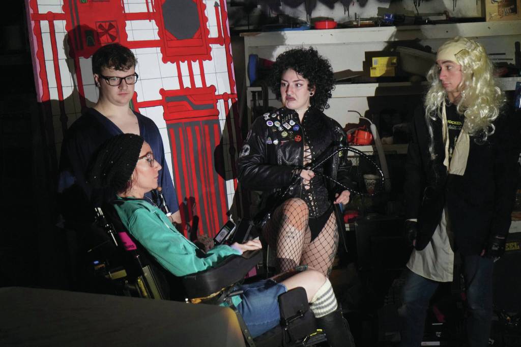 The cast of Intuition Salons shadow cast of The Rocky Horror Picture Show rehearse in Kenai on Monday.