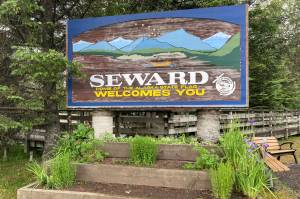 A sign welcomes visitors on July 7, 2021, in Seward, Alaska. (Photo by Jeff Helminiak/Peninsula Clarion)