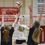 Soldotna's Cassidy Kruse attacks against Kenai Central's Ellsi Miller and Sophie Tapley on Friday, Nov. 1, 2024, at Kenai Central High School in Kenai, Alaska. (Photo by Jeff Helminiak/Peninsula Clarion)