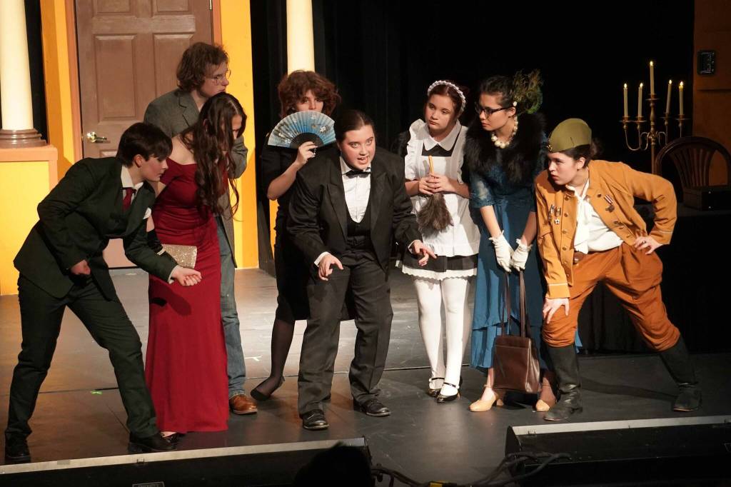 The cast of Seward High School Theatre Collectives Clue rehearse at Seward High School in Seward, Alaska, on Thursday, Nov. 7, 2024. (Jake Dye/Peninsula Clarion)