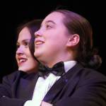 Somi Clendaniel, as Miss Scarlet, and Angel Wagner, as Wadsworth, rehearse Seward High School Theatre Collectives Clue at Seward High School in Seward, Alaska, on Thursday, Nov. 7, 2024. (Jake Dye/Peninsula Clarion)