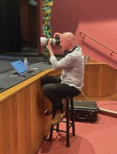 Photo by Emilie Springer/Homer News
Christopher Kincaid, sound technician, takes photos for the 2024 Nutcracker production at rehearsal on Sunday, Nov. 10<ins>, 2024,</ins> in the Homer Mariner Theatre<ins> in Homer, </ins><ins>Alaska</ins>.
