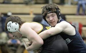 Soldotnas Carson Cobb maintains a hold of Jett Connolly of the Student Wrestling Development Program during the 130-pound final of the Colony Invitational on Saturday, Nov. 23, 2024, at Colony High School in Palmer. (Photo by Jeremiah Bartz/Frontiersman)