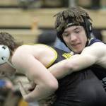 Soldotnaճ Carson Cobb maintains a hold of Jett Connolly of the Student Wrestling Development Program during the 130-pound final of the Colony Invitational on Saturday, Nov. 23, 2024, at Colony High School in Palmer. (Photo by Jeremiah Bartz/Frontiersman)