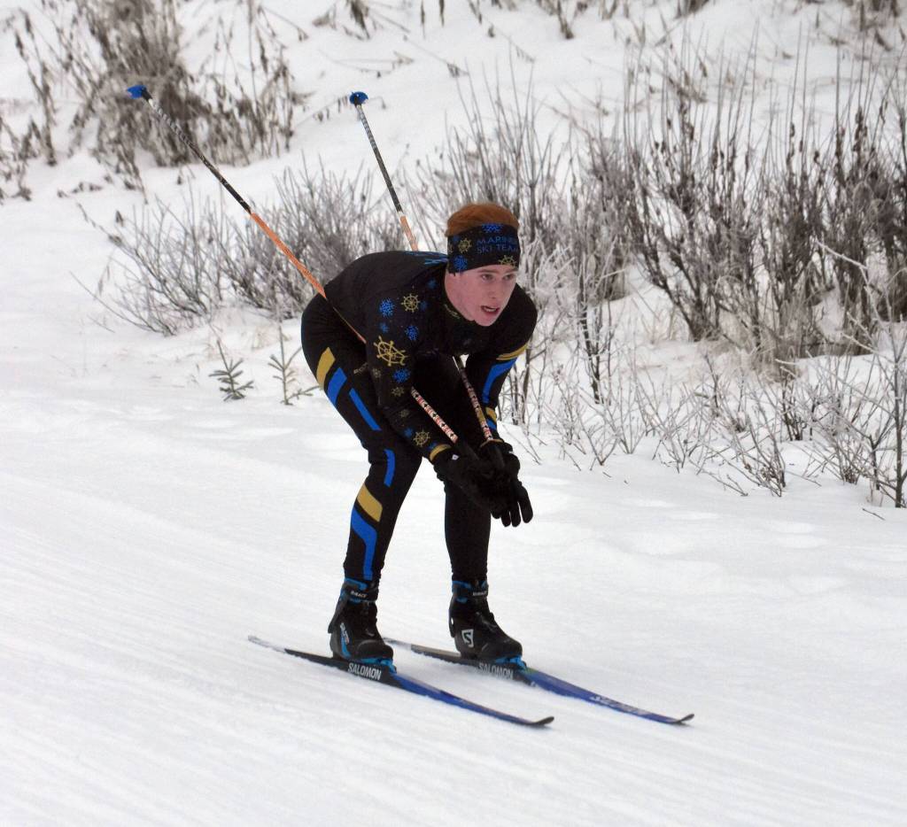 Homers Jody Goodrich nears the finish of the boys varsity race of the Turkey Skate on Tuesday, Nov. 26, 2024, at Tsalteshi Trails just outside of Soldotna, Alaska. (Photo by Jeff Helminiak/Peninsula Clarion)