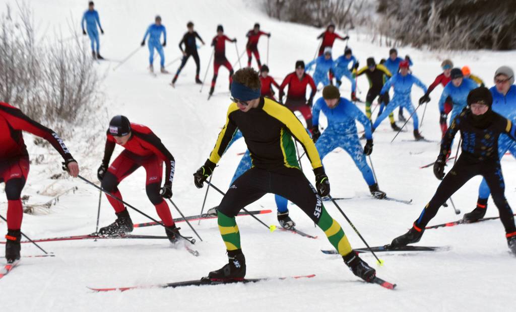 Sewards Oliver Trobaugh leads a group of skiers near the start of the boys varsity race of the Turkey Skate on Tuesday, Nov. 26, 2024, at Tsalteshi Trails just outside of Soldotna, Alaska. (Photo by Jeff Helminiak/Peninsula Clarion)
