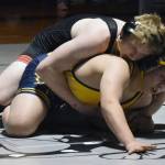 Kenai Centrals Thaddeus Lingenfelter works his pay to a win of Homers Gaius Taylor on Tuesday, Nov. 26, 2024, at Nikiski Middle-High School in Nikiski, Alaska. (Photo by Jeff Helminiak/Peninsula Clarion)