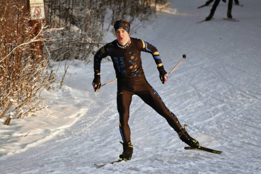 Homers Leif Jaworski takes the early lead in going on to win the boys race at the Candy Cane Scramble on Friday, Dec. 20 at Tsalteshi Trails just outside of Soldotna. (Photo by Jeff Helminiak/Peninsula Clarion)