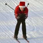 Kenai Central's Fletcher Darr cruises down a hill at the Candy Cane Scramble on Friday, Dec. 20, 2024, at Tsalteshi Trails just outside of Soldotna, Alaska. (Photo by Jeff Helminiak/Peninsula Clarion)