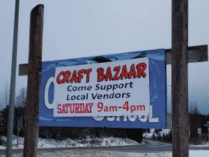 A banner advertises the Last-Chance Craft Bazaar, held in the Chapman School gym on Saturday, Dec. 21<ins>, 2024,</ins> in Anchor Point<ins>, Alaska</ins>. (Delcenia Cosman/Homer News)