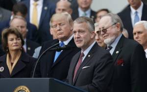 U.S. Sen. Dan Sullivan, R-Alaska, addresses a crowd with President-elect Donald Trump present. (Photo from U.S. Sen. Dan Sullivans office)