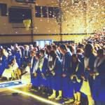 Homer High School class of 2024 rises at the end of the Tuesday evening commencement program before heading to the Commons to be welcomed by friends and family. Emilie Springer/ Homer News