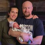 Benedict Joseph Traugott, South Peninsula Hospitals first baby of 2024, is pictured with his parents Elizabeth and Nathan Traugott.