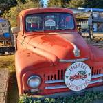 An old truck belonging to Homers Jeans advertises fresh-cut Christmas trees on Thursday, Jan. 2, 2025, in Homer, Alaska. (Delcenia Cosman/Homer News)