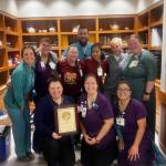 South Peninsula Hospitals Long Term Care staff celebrate being awarded the 2024 Commitment to Quality Award by The American Health Care Association and National Center for Assisted Living. Photo courtesy Derotha Ferraro