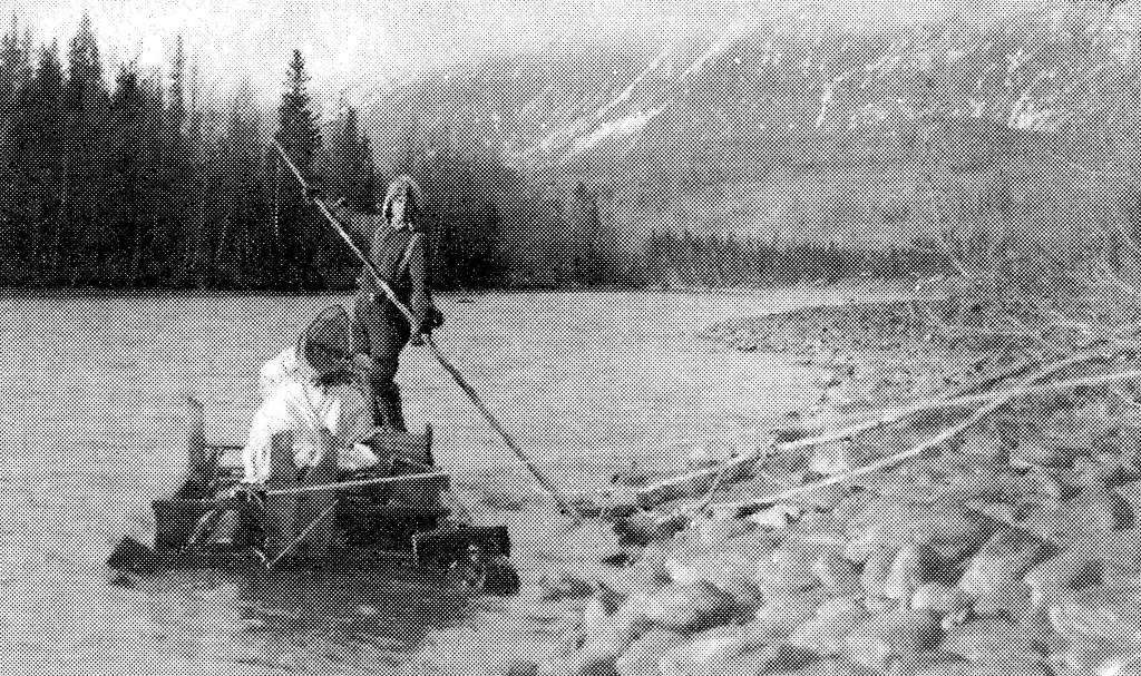 U.S. Forestry Department photo by John Jack Brown
Keith McCullagh is photographed poling a raft down the Kenai River in 1911 during a forest survey.