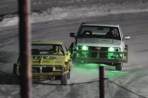 Jake Dye/Peninsula Clarion
Racers vie for the lead in the second race of the Kenai Peninsula Ice Racing season at Twin City Raceway in Kenai on Tuesday, Dec. 31.