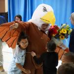 Students embrace Aubrie Ellis after she was named National Outstanding Assistant Principal of 2025 by the Alaska Association of Elementary School Principals at Mountain View Elementary School in Kenai, Alaska, on Friday, Jan. 10, 2025. (Jake Dye/Peninsula Clarion)