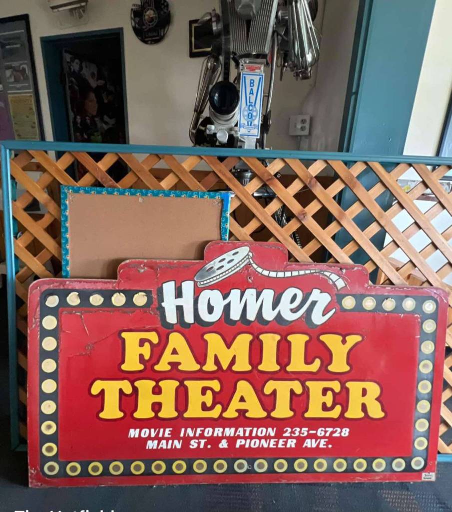 The sign for the Homer Family Theater sits inside the Homer Theatre lobby in this undated photo. Photo provided by Tim Hatfield
