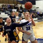 Homers Channing Lowney tries to knock the ball away from Palmers Kaelyn Downey during a loss to the Moose on Friday, Jan. 10, 2025, the second day of the Palmer Elks Showdown at Palmer High School. Photo courtesy of Bruce Eggleston