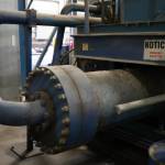 A disconnected baler ram has bent piping and caused other damage at the Central Peninsula Landfill in Soldotna, Alaska, on Thursday, Jan. 16, 2025. (Jake Dye/Peninsula Clarion)