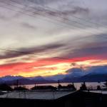 The sun rises over the mountains across Kachemak Bay on Monday, Jan. 20, 2025, in Homer, Alaska. (Delcenia Cosman/Homer News)
