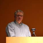 Steve Delehanty, the former manager of the Alaska Maritime National Wildlife Refuge Visitor Center, addresses a crowd gathered to celebrate his public service on Tuesday, Jan. 21, 2025. (Chloe Pleznac/Homer News)