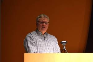 Steve Delehanty, the former manager of the Alaska Maritime National Wildlife Refuge Visitor Center, addresses a crowd gathered to celebrate his public service on Tuesday, Jan. 21, 2025. (Chloe Pleznac/Homer News)