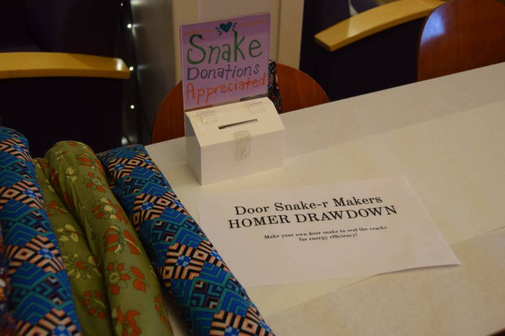 The snake-making station at the 2025 Homer Drawdown Energy Fair on Saturday, Jan. 25, 2025 at Kachemak Bay Campus. (Chloe Pleznac/Homer News)