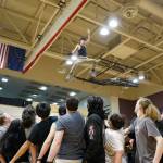 More than 50 people work together to perform a traditional blanket toss during the Kahtnuhtana Hey Chiula Native Youth Olympics Invitational at Skyview Middle School near Soldotna, Alaska, on Sunday, Jan. 26, 2025. (Jake Dye/Peninsula Clarion)