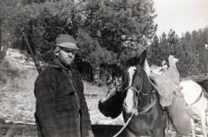 Poopdeck Platt, in western Montana circa 1946, packs out a deer after a successful day of hunting. (Photo courtesy of the Huebsch Family Collection)