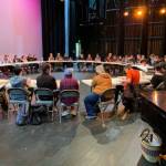 Homer High School choral program students gather onstage at the Mariner Theater for the first reading of this years musical, Singin in the Rain, on Tuesday, Jan, 28, 2025. (Photo courtesy of Homer High School Choral Program)